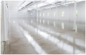 Drying a polished concrete floor