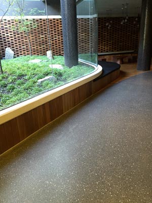 green building with polished concrete floor