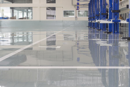 epoxy flooring in a car workshop